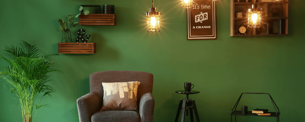 不動産買取のイメージ（グリーン壁とペンダント照明の部屋）｜久留米市。